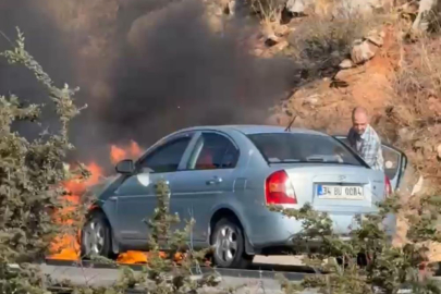 Otomobili otobanda alev aldı