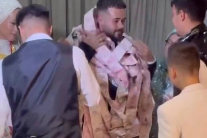 Bursa’da damadı paraya boğdular