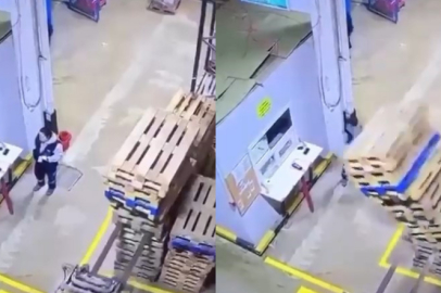 Paletlerin altında kalmaktan son anda kurtuldu