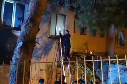 Bursa'da korkutan yangın: İtfaiye ekipleri camı kırıp içeri girdi
