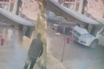 Alışveriş sonrası otomobilin altında kaldı